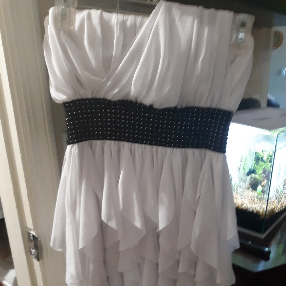 White single-strap ruffle dress